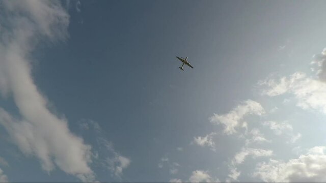 waving to passing military aircraft 