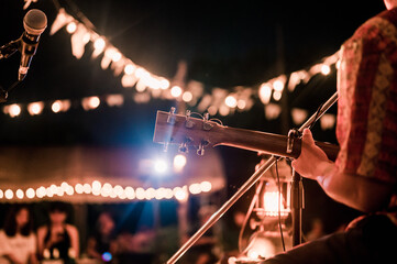 Musicians playing guitar at music festivals, lights,  music, concerts, mini concerts. music...