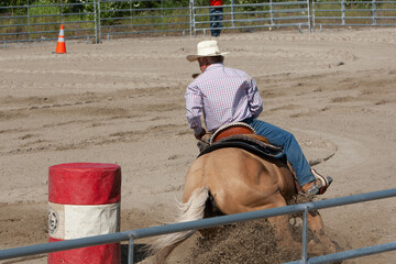 A rider drives his horse during a equestrian competition