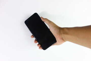 hand holding a phone