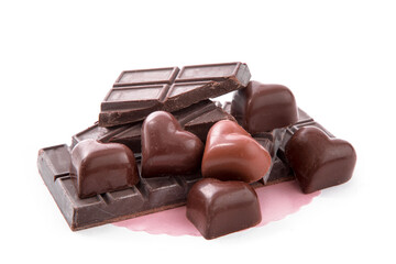 dark valentines chocolate heart candies and raw chocolate isolated on white
