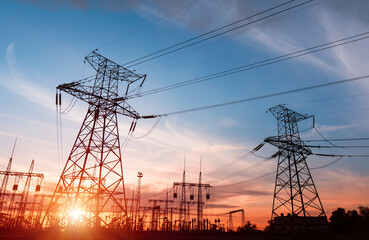 High voltage electric transmission tower. Distribution electric substation with power lines and...