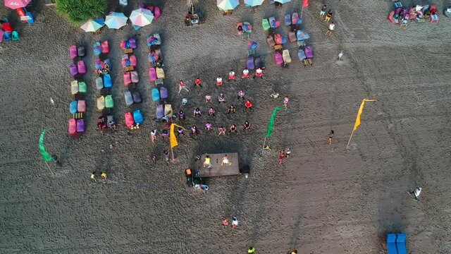 Group of people in dance class held on a resort on Legian Beach, Bali