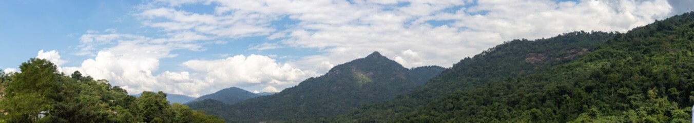 Beautiful panoramic view of sky and mountains at Khun Dan Prakan Chon Dam, Nakhon Nayok Province, Thailand.