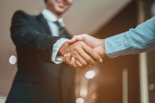 Businessman shake hands and get to know each other before they start talking about business.Bussiness,working, success concept