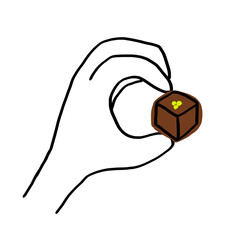 ピスタチオチョコレートをつまむ手　　バレンタイン
