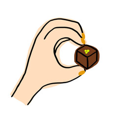 ピスタチオチョコレートをつまむ手　オレンジネイル　ティータイム
