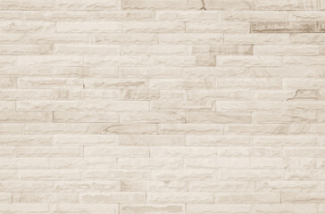 Fototapeta premium Empty Background of wide cream brick wall texture. Old brown brick wall concrete or stone pattern nature, wallpaper limestone abstract floor/Grid uneven interior rock. Home & office design backdrop.