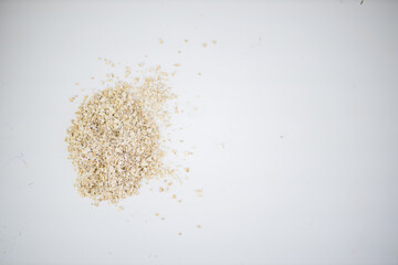 Small pile of dark rye flour on a white table