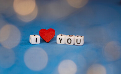 I love you on a colored background . Valentine's Day. The concept of love and beauty