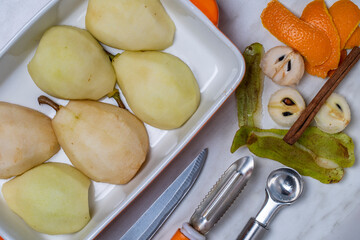 Prepared and peeled pears for baking in the oven, close up