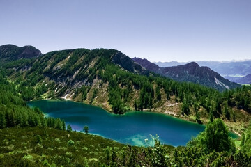 Fototapeta na wymiar glittering water from a wonderful blue mountain lake
