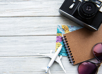 Traveler accessories on wooden  background