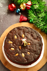 Oven fresh rich plum cake - Christmas holidays background concepts.