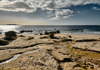 Beach and Atlantic ocean with blue sky