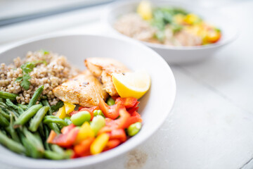 Meat and buckwheat dishes with green beans and tomato