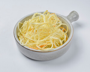 Suluguni cheese served in a white bowl over white background, isolated on white. Georgian cuisine concept.