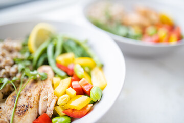 Meat and buckwheat dishes with green beans and tomato