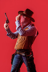 American bandit in mask, western man with hat. Man wearing cowboy hat, gun. West, guns. American...