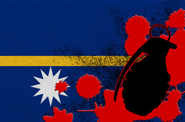 Nauru flag and MK2 frag grenade in red blood. Concept for terror attack or military operations with lethal outcome