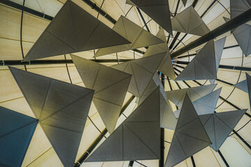 Decorative triangles under the roof of the building