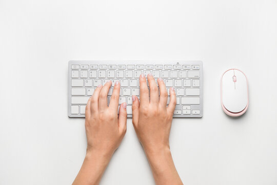 Female Hands With Computer Keyboard On White Background