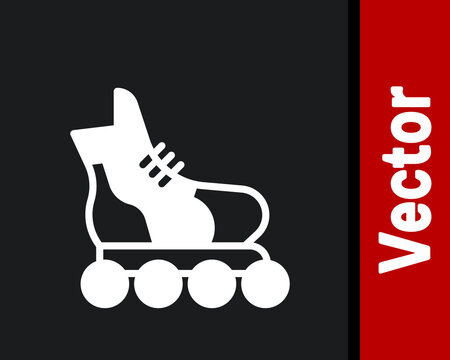 White Roller skate icon isolated on black background. Vector.