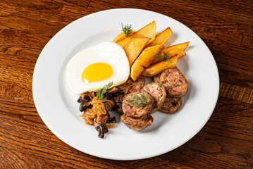 breakfast with fried egg and sausage