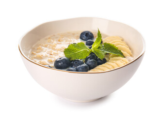 Bowl with tasty oatmeal and blueberry on white background