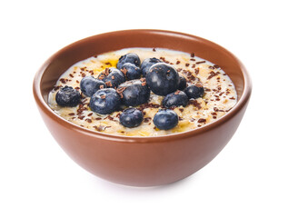 Bowl with tasty oatmeal and blueberry on white background