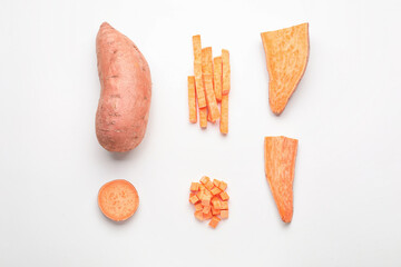 Fresh sweet potatoes on white background