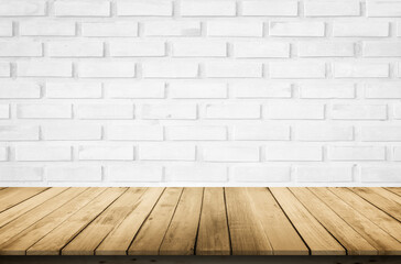 Empty wooden table top on white brick wall background, Design wood terrace white. Perspective for show space for your copy and branding. Can be used as product display montage. Vintage style concept.