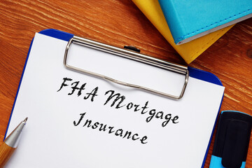 Business concept about FHA Mortgage Insurance with phrase on the sheet.