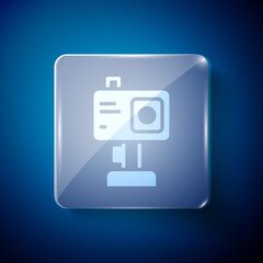 White Action extreme camera icon isolated on blue background. Video camera equipment for filming extreme sports. Square glass panels. Vector.