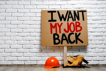 Ptotestive placards against job loss during coronavirus pandemic