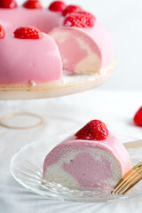 Sweet strawberry mousse cake dessert on a plate
