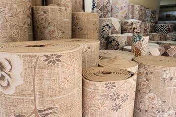 Various rugs in the carpet shop. Home decoration.