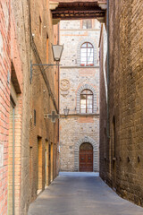 Fototapeta premium Old Alley in a city