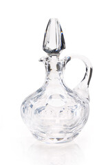 Lead cut crystal decanter isolated on white, contains clipping path.