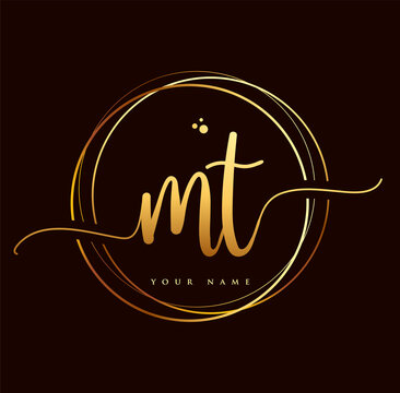 MT Initial handwriting logo golden color. Hand lettering Initials logo branding, Feminine and luxury logo design isolated on black background.