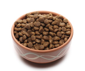 Dog food, dry round granules for pets in bowl isolated on white background