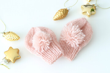Fototapeta na wymiar cute baby hand knitted wool mittens