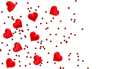 Red romantic hearts on a white background with copy space. Valentine's day texture. Love concept. Top view