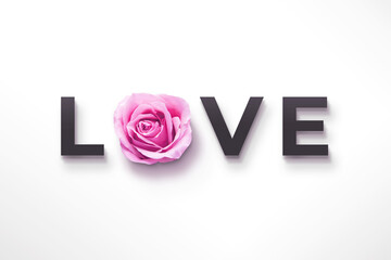 Love text with a pink Rose