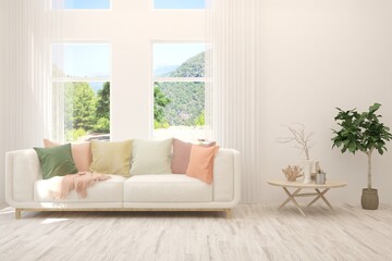 White living room with sofa and summer landscape in window. Scandinavian interior design. 3D illustration