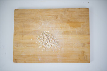 Small pile of dark rye flour on a cutting board