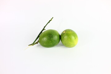 immature lemon in white background