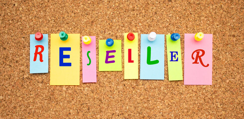 Color notes with letters pinned on a board. Word RESELLER.
