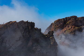 people on viewpoint at the pico arieiro on madeira island