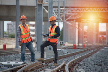 Two worker check switching on railway. worker work on railways. Engineers are describing work on...